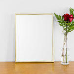 Poster With Gold Frame Mockup on Wooden Floor
