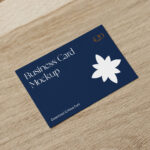 Realistic Business Card on a Wooden Surface Mockup