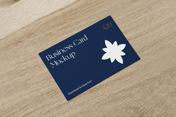Realistic Business Card on a Wooden Surface Mockup