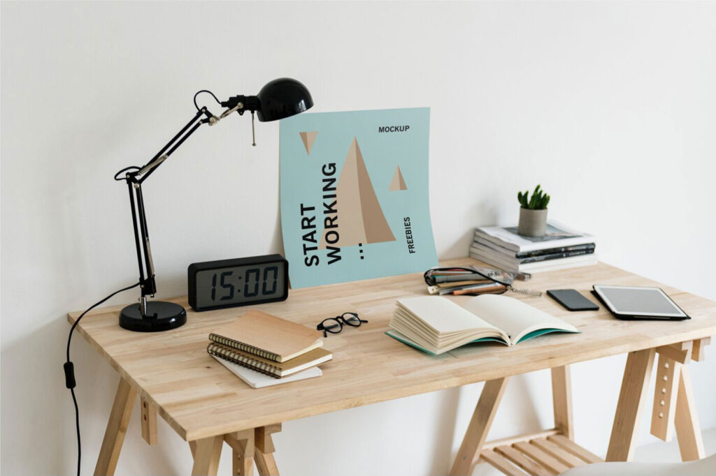 Realistic Mockup Featuring a Poster on a Desk