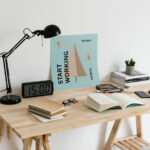 Realistic Mockup Featuring a Poster on a Desk