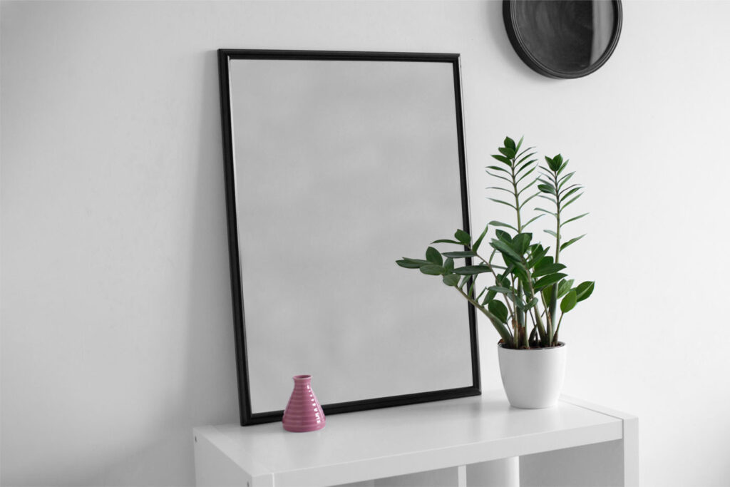 Realistic Poster on White Desk Mockup