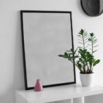 Realistic Poster on White Desk Mockup