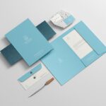 Realistic Stationery Mockup Featuring File, Envelope, Letterhead, and Business Card