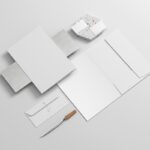 Realistic Stationery Mockup Featuring File, Envelope, Letterhead, and Business Card