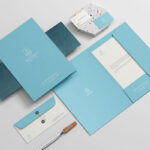 Realistic Stationery Mockup Featuring File, Envelope, Letterhead, and Business Card