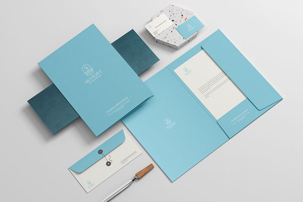 Realistic Stationery Mockup Featuring File, Envelope, Letterhead, and Business Card
