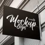 Rectangular Sign Board Mounted on Outdoor Shop’s Wall Mockup