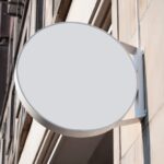 Round Sign Mockup on Building