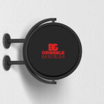 Round Signage Put up on the Wall in Half-Side View Mockup
