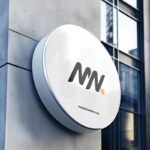 Round Signboard Mockup on Building Wall