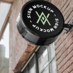Rounded Sign Mockup on Brick Building Wall