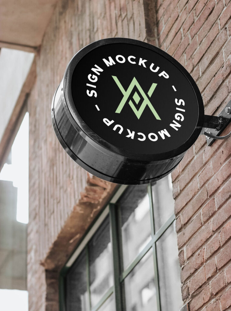 Rounded Sign Mockup on Brick Building Wall
