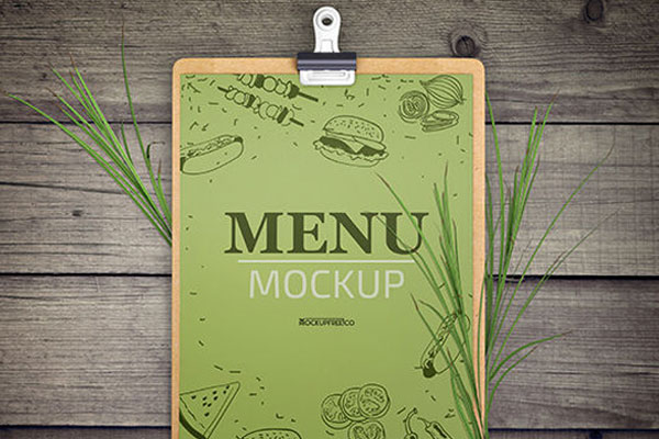 Set of Three Menu Mockups on a Wooden Table