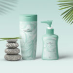 Shampoo and Lotion Bottle Mockup with Leaves and Stones