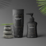 Shampoo and Lotion Bottle Mockup with Leaves and Stones