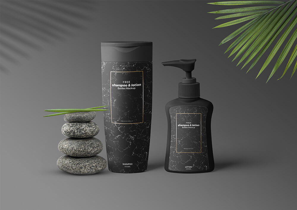 Shampoo and Lotion Bottle Mockup with Leaves and Stones