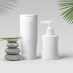 Shampoo and Lotion Bottle Mockup with Leaves and Stones