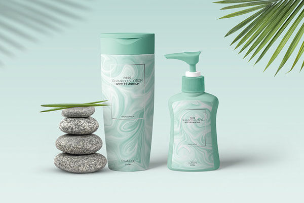 Shampoo and Lotion Bottle Mockup with Leaves and Stones