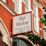 Sign Mockup on Brick Building in Perspective View