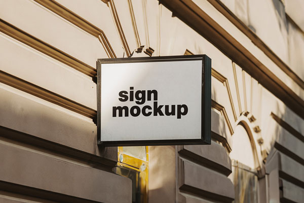 Signboard Mockup on Building Wall