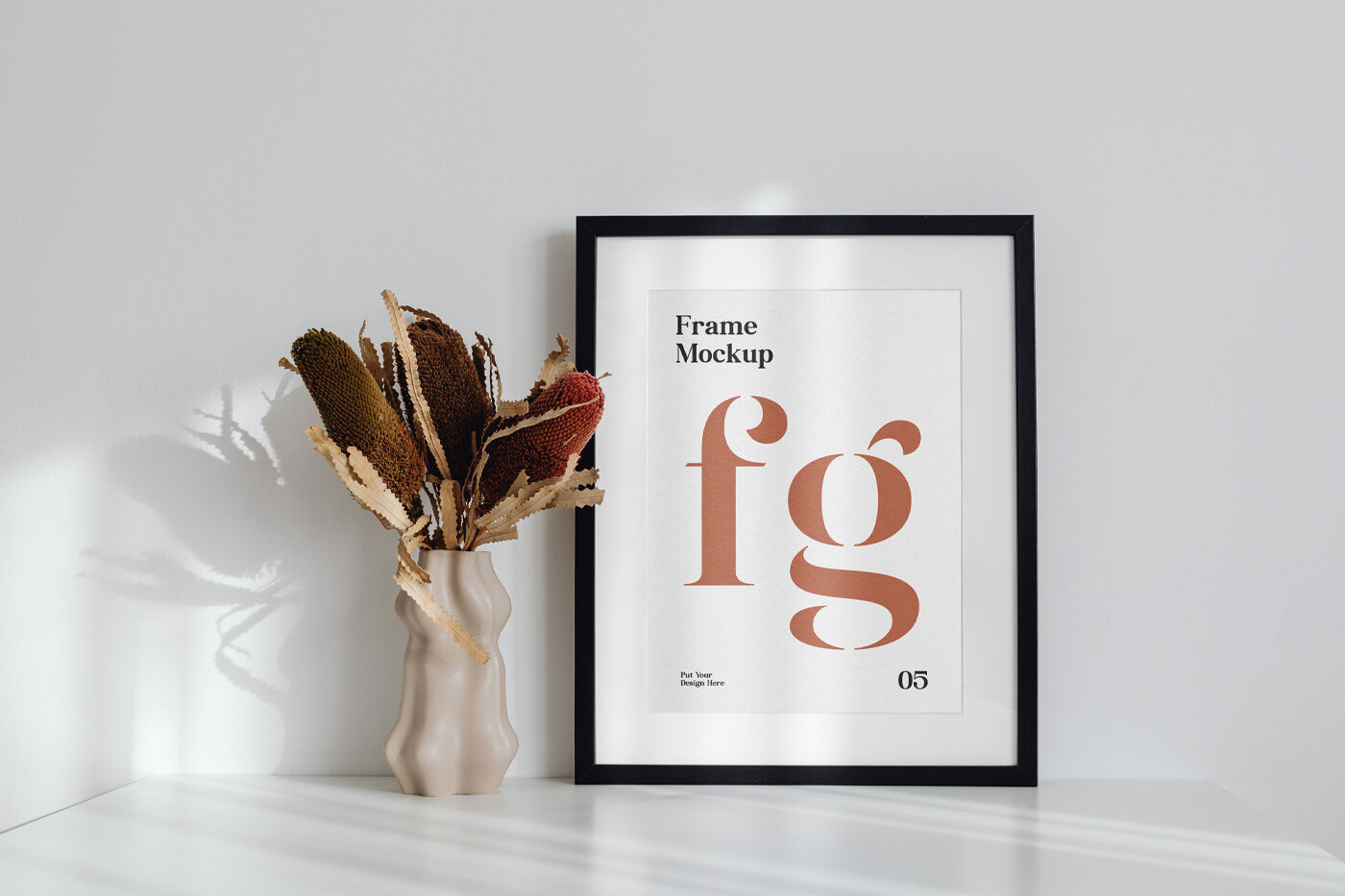 Simple Frame on the Desk Mockup Next to a Flower FREE PSD