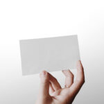 Single Business Card in a Person’s Hand Mockup