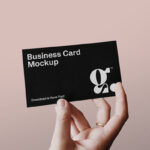 Single Business Card in a Person’s Hand Mockup