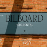 Small Billboard on Brick Wall Mockup