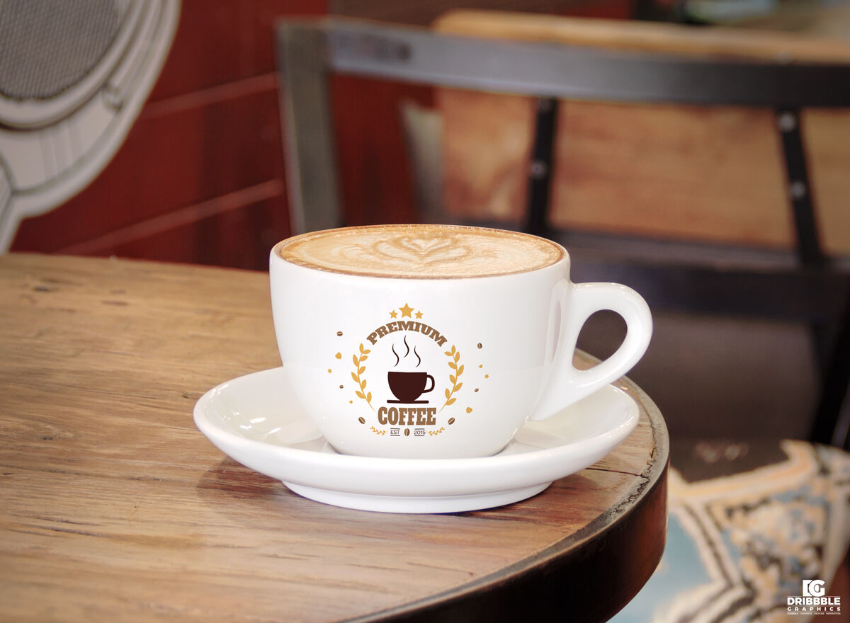 Small Coffee Cup on a Wooden Table Mockup FREE PSD