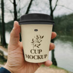 Small Paper Cup in Hand Mockup