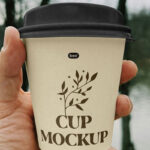 Small Paper Cup in Hand Mockup