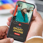 Smartphone Holding by Hand in Top View Mockup