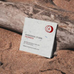 Square Business Card Mockup Laid on a Wood
