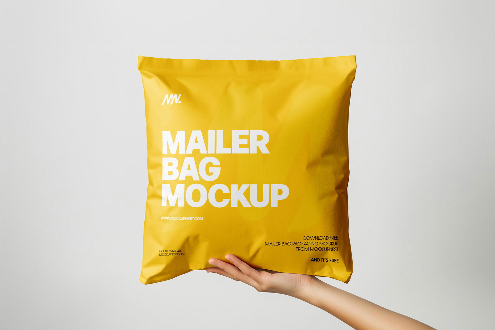 Free Square Paper Mailer Bag Mockup Holding by Hand PSD Template