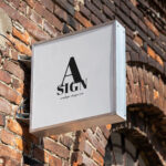 Square Sign Stick on the Side to an Old Brick Wall Mockup