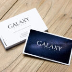 Stack of Business Cards on Wooden Floor Mockup