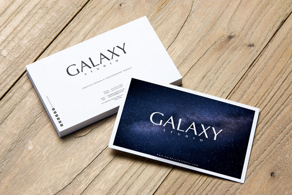 Stack of Business Cards on Wooden Floor Mockup