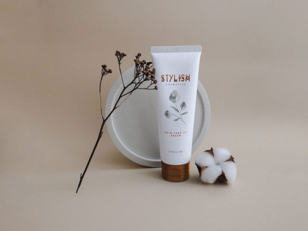 Standing Cream Tube Mockup with Decorative Elements