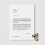 Stationery Mockup Featuring A4 Paper and Stamp in Top View