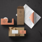 Stationery Mockup Featuring Envelope, Paper and Tape Dispenser