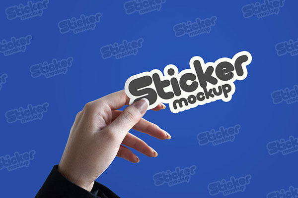 Sticker Mockup Featuring a Female Hand Holding it in Front View
