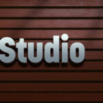 Studio Bold Logo Design Mockup / Text Effect on a Wooden Wall