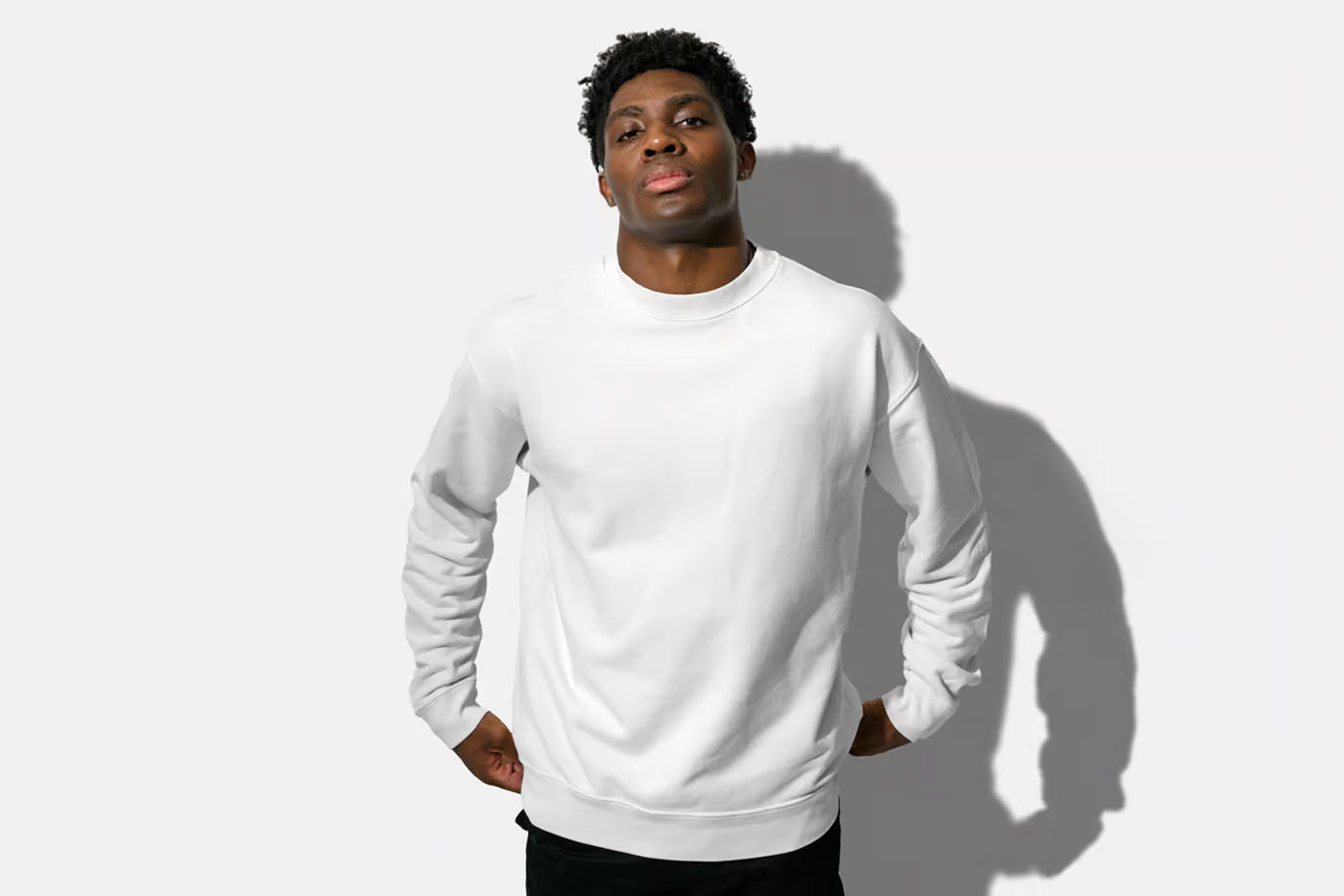 Free Sweatshirt on Men Mockup PSD Template