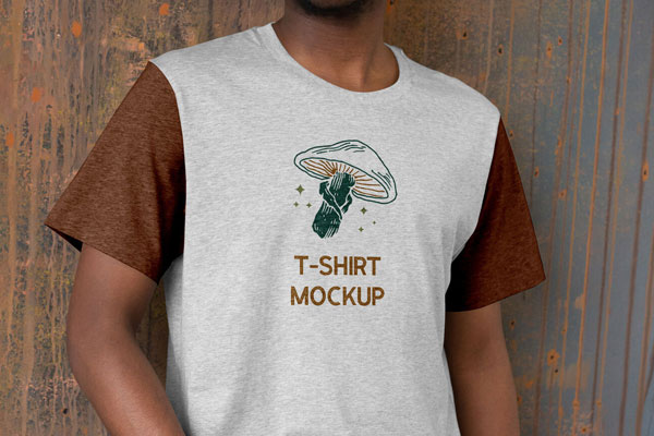 T-Shirt Mockup of a Model Standing with One Hand in Pocket