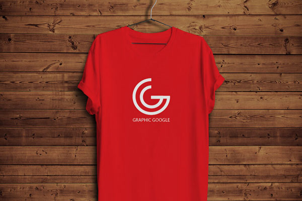 T-Shirts Mockup With Hanger on the Front Wooden Scene