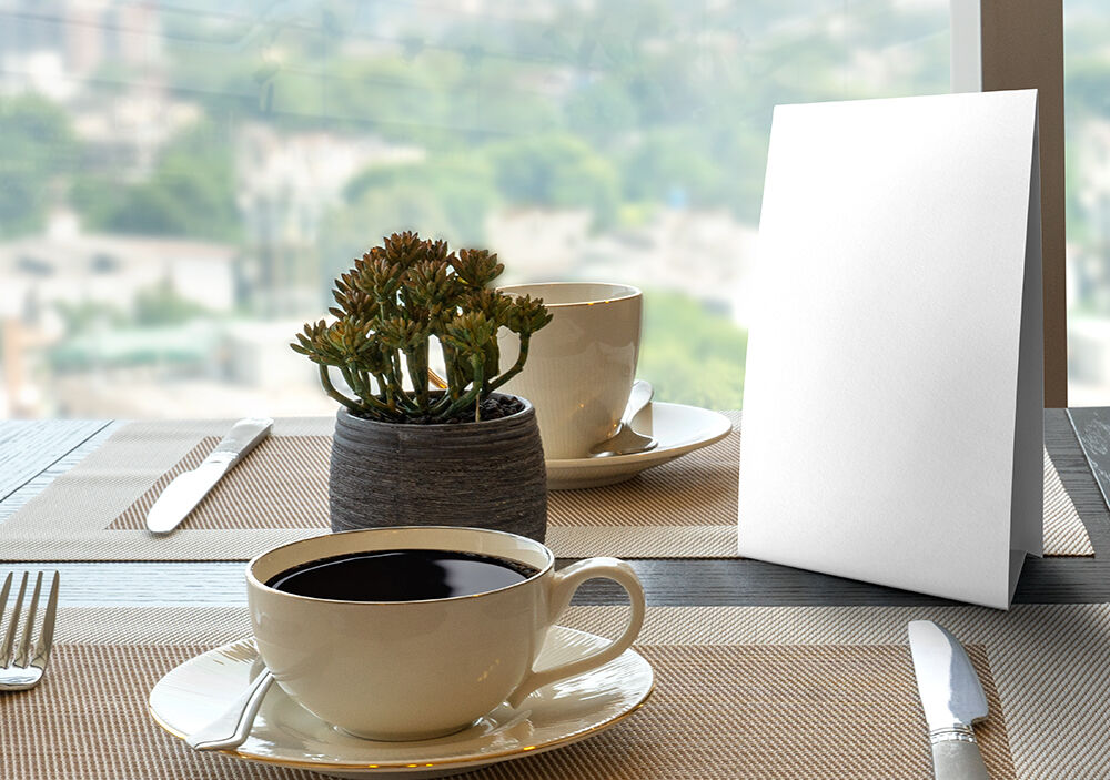 Table Tent Card in a Realistic Environment Mockup FREE PSD