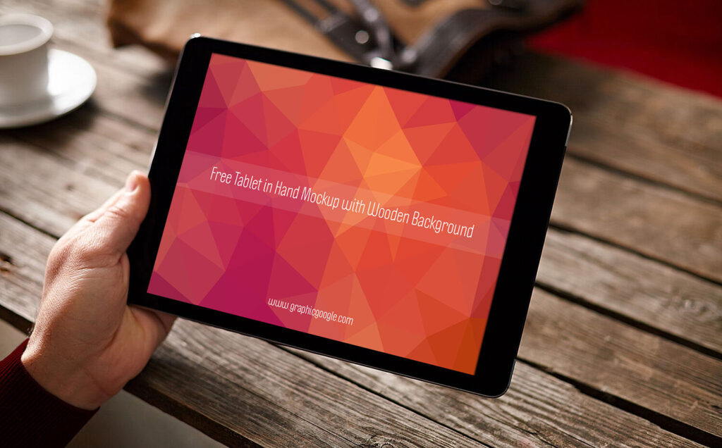 Tablet Hand Mockup Wooden Blurred Background