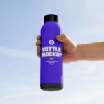 Tall Bottle in Hand Mockup