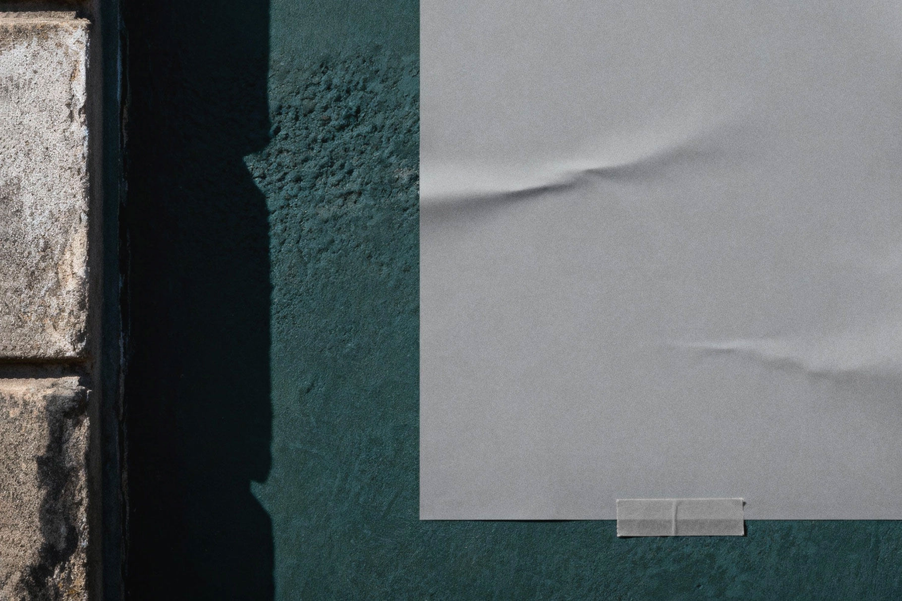 Free Taped Wall Poster Mockup PSD Template